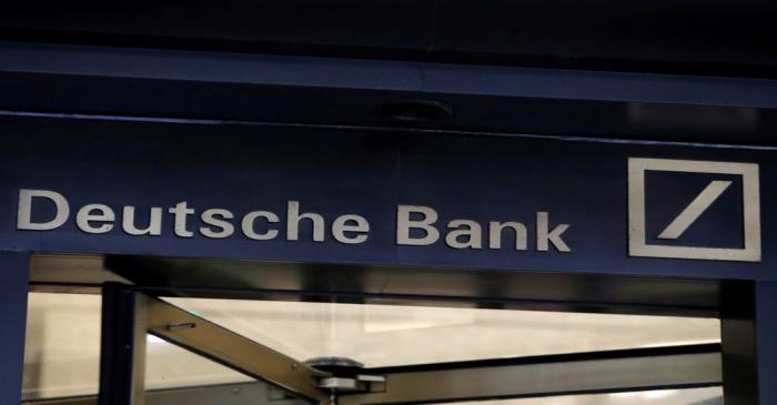 Signage is seen on the lobby of the U.S. headquarters of Deutsche Bank in New York City