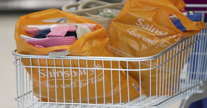 FILE PHOTO:  Bags sit in a shopping trolley at a Sainsbury's store in London