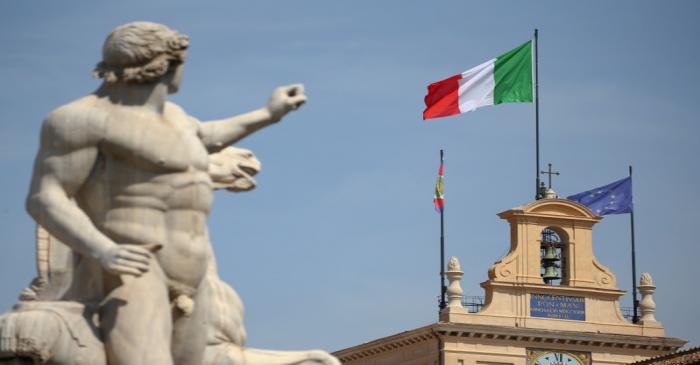 The Italian flag waves over the Quirinal Palace in Rome