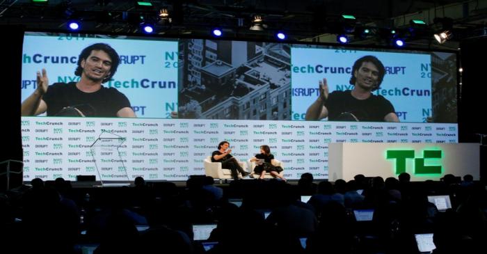 FILE PHOTO: Neumann, CEO of WeWork, speaks to guests during the TechCrunch Disrupt event in