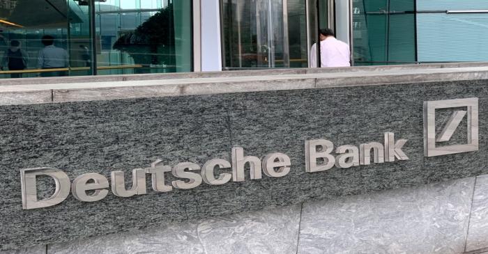 FILE PHOTO: The logo of Deutsche bank is seen in Hong Kong