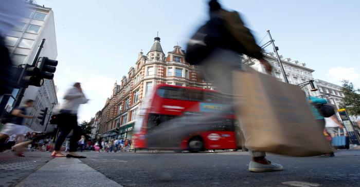 FILE PHOTO: File photo of shoppers crossing the road in Oxford Street, in London