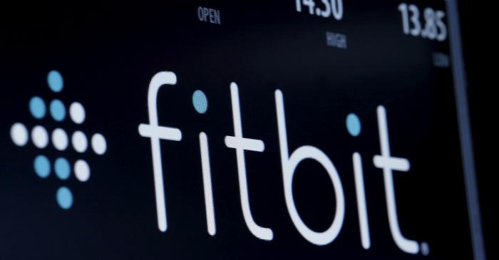 The ticker symbol for Fitbit is displayed at the post where it is traded  on the floor of the
