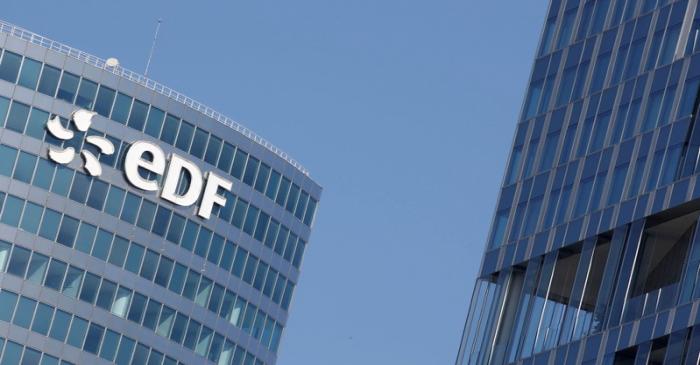 FILE PHOTO: The logo of Electricite de France SA (EDF) is pictured on the facade of a building