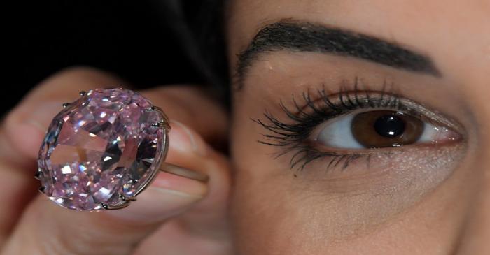 FILE PHOTO: A model poses with a 59.60-carat mixed cut diamond known as 