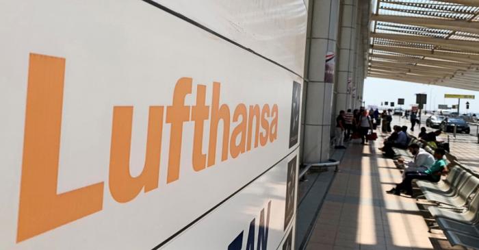 Deutsche Lufthansa sign is seen in front of the airport terminal at Cairo International Airport