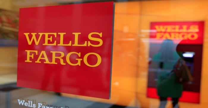 FILE PHOTO: A Wells Fargo sign is seen outside a banking branch in New York