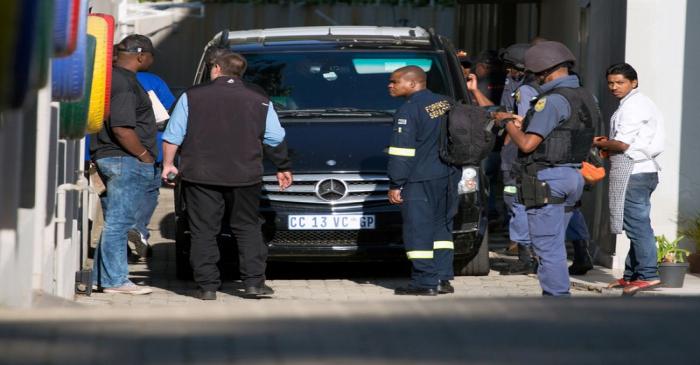 FILE PHOTO: Police raid the home of the Gupta family, friends of President Jacob Zuma, in