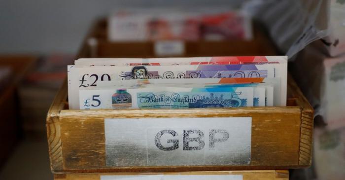 British Pound Sterling banknotes are pictured at the Money Service Austria company's