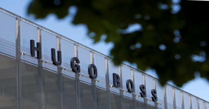 The Hugo Boss logo is seen on a store in Metzingen