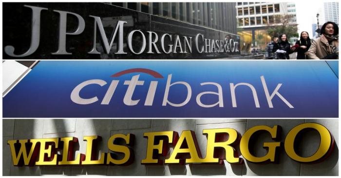 FILE PHOTO: FILE PHOTOS: A combination photo of signs of JP Morgan Chase Bank, Citibank and
