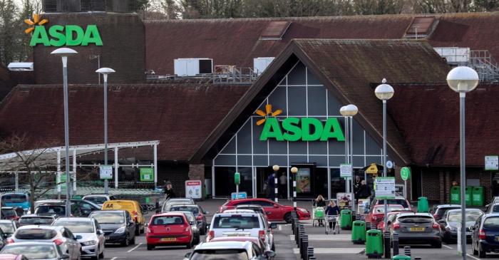 FILE PHOTO: Shoppers leave the Asda superstore in High Wycombe