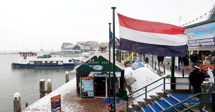 A Dutch flag in the port of Volendam near Amsterdam