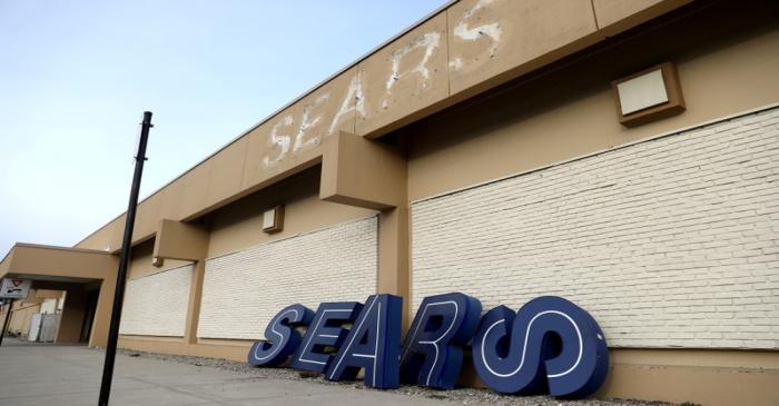 FILE PHOTO: Dismantled sign sits leaning outside a Sears department store in Nanuet