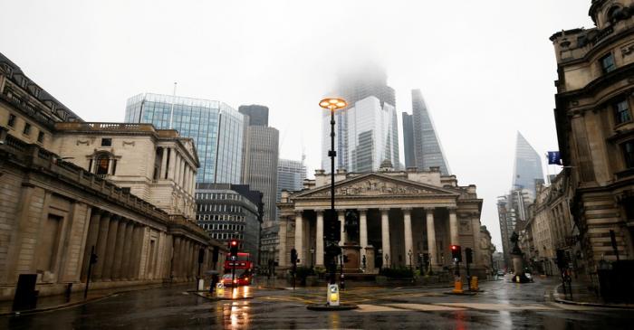 FILE PHOTO: The Bank of England is seen in the financial district during rainy weather in