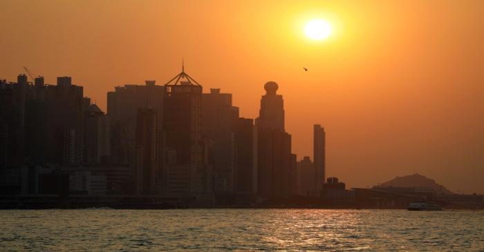 Harbour skyline is seen during sunset in Hong Kong
