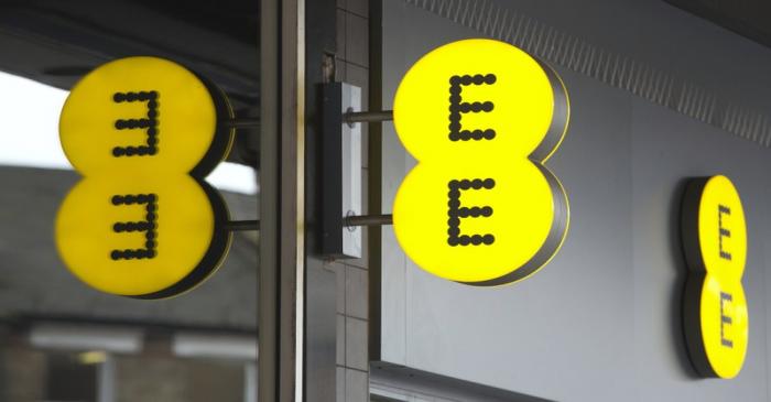 FILE PHOTO: An Everything Everywhere (EE) mobile phone store sign is seen in London