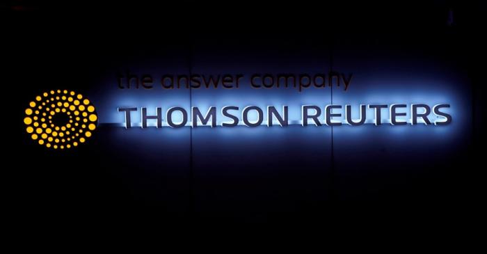 FILE PHOTO: A Thomson Reuters logo is pictured on a building during the World Economic Forum