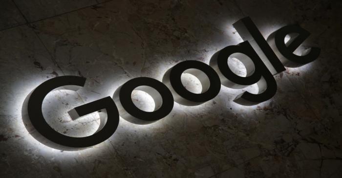 A Google logo is displayed at the entrance to the internet based company's offices in Toronto