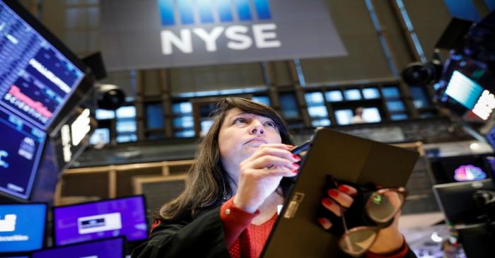 A trader works on the floor at the NYSE in New York