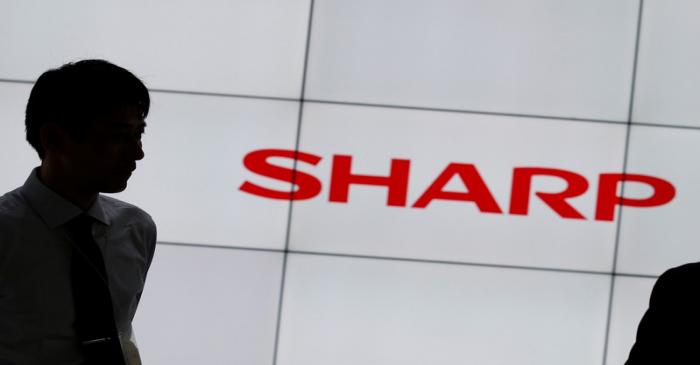 A logo of Sharp Corp is pictured at CEATEC (Combined Exhibition of Advanced Technologies) JAPAN