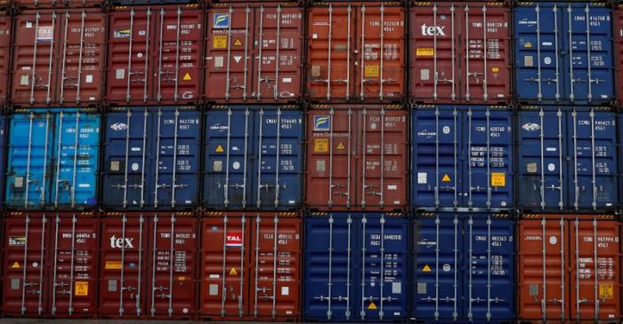 FILE PHOTO: Shipping containers are stacked at the Peel Ports container terminal in Liverpool