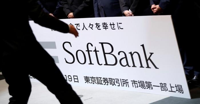 FILE PHOTO: SoftBank Corp placard is prepared during a ceremony to mark the company's debut on