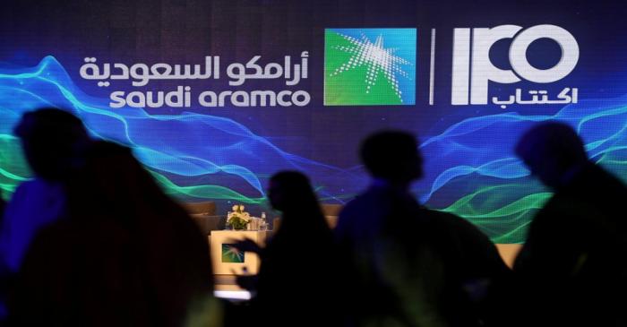 Sign of Saudi Aramco's IPO is seen during a news conference by the state oil company in Dhahran