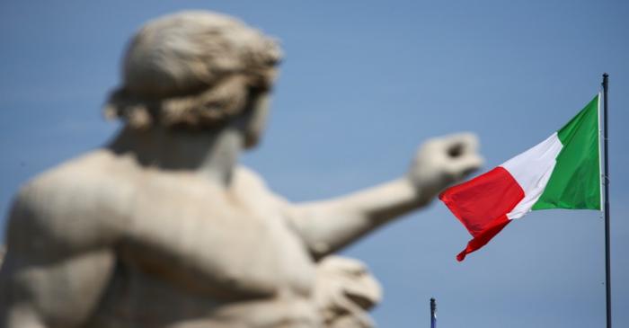 The Italian flag waves over the Quirinal Palace in Rome