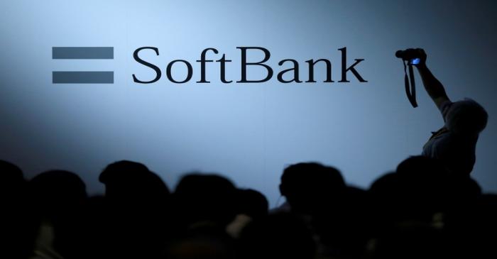FILE PHOTO: The logo of SoftBank Group Corp is displayed at the SoftBank World 2017 conference