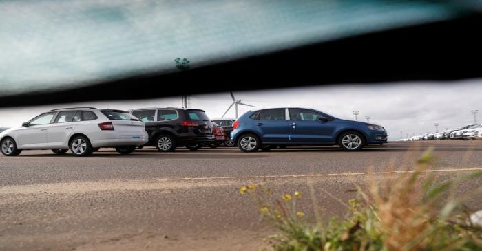 Imported cars are parked in a storage area at Sheerness port, Sheerness