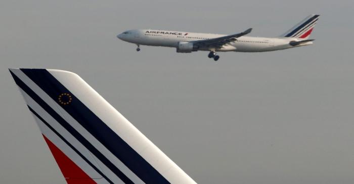 FILE PHOTO: An Air France Airbus A330 airplane lands at the Charles-de-Gaulle airport in Roissy