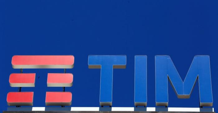 FILE PHOTO: Telecom Italia's logo for the TIM brand is seen on building roof downtown Milan