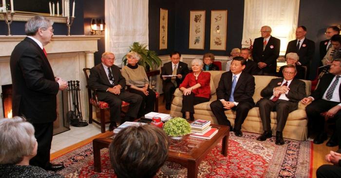 FILE PHOTO: Iowa Governor Terry Branstad (L) makes a few remarks to China's Vice President Xi