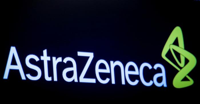 FILE PHOTO: The company logo for pharmaceutical company AstraZeneca is displayed on a screen on