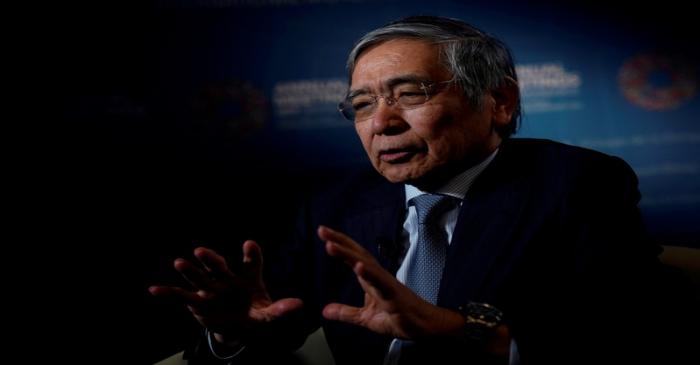 FILE PHOTO: Bank of Japan (BOJ) Governor Haruhiko Kuroda, speaks during an interview with