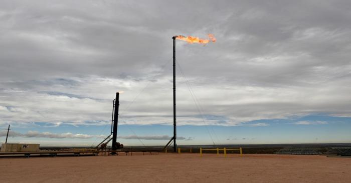 FILE PHOTO: Natural gas flares off at a production facility near Carlsbad