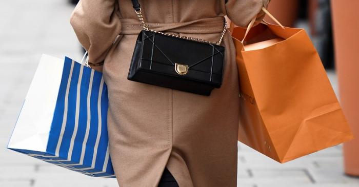 A woman carries her shopping bags in downtown Hamburg