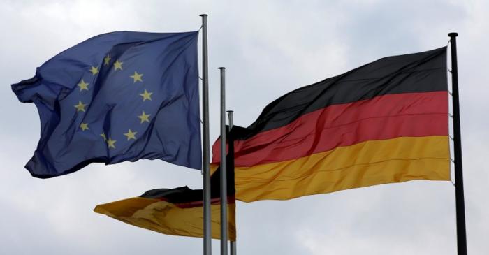 The European Union and German nation flags are pictured before a debate on the consequences of