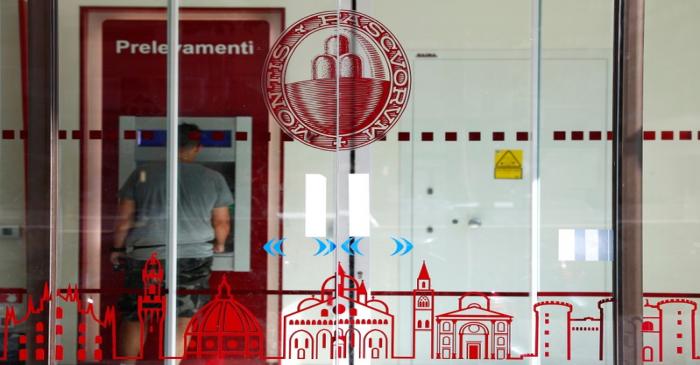 FILE PHOTO: The logo of Monte dei Paschi di Siena bank is seen in a bank entrance in Rome
