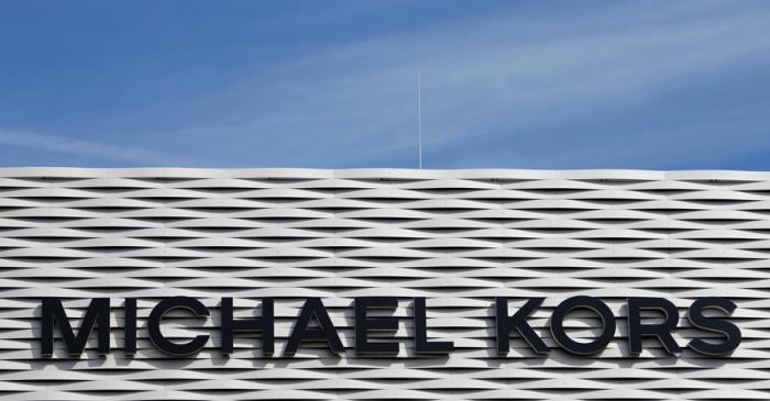 FILE PHOTO: The logo of Michael Kors is seen on an outlet store in Metzingen