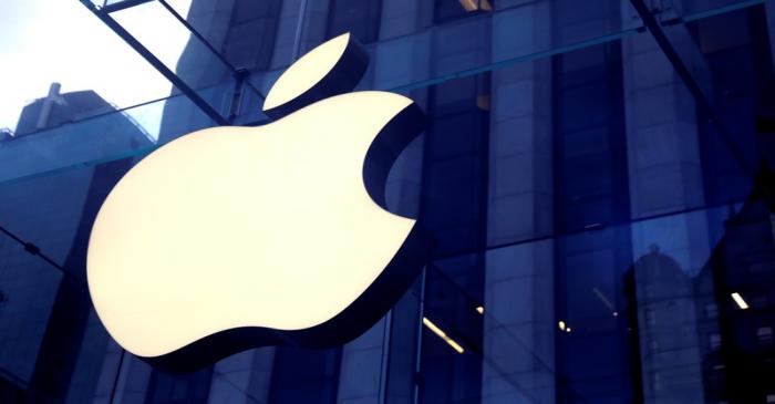 The Apple Inc. logo is seen hanging at the entrance to the Apple store on 5th Avenue in New