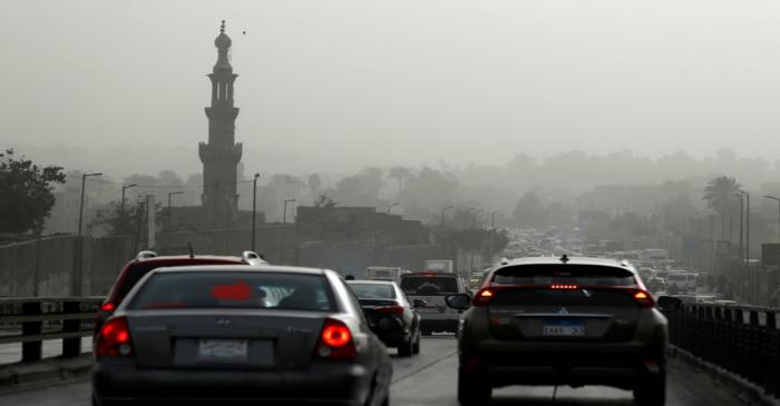 FILE PHOTO: Cars sit in traffic on El Sayeda Aisha Bridge during a sandstorm in Cairo