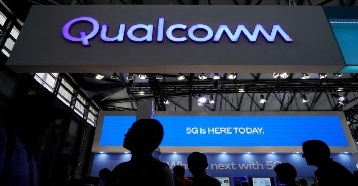 FILE PHOTO: A Qualcomm sign is pictured at Mobile World Congress (MWC) in Shanghai