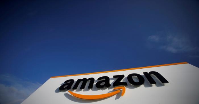 FILE PHOTO: The logo of Amazon is seen at the company logistics centre in Boves