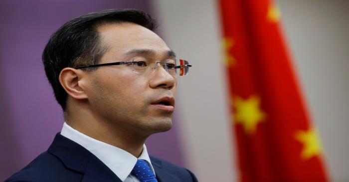 China's Ministry of Commerce spokesperson Gao Feng attends a news conference in Beijing