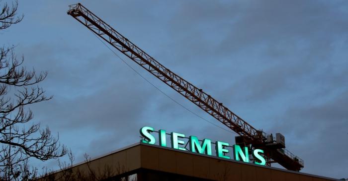 FILE PHOTO: Logo of German industrial group Siemens is seen in Zurich