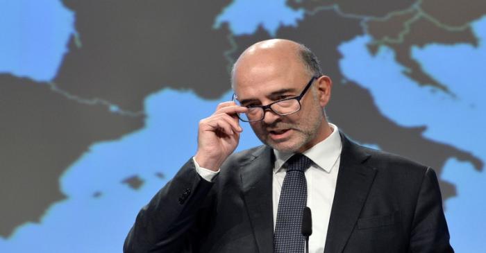 European Commissioner for Economic and Financial Affairs Pierre Moscovici presents the EU