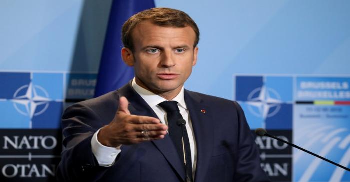 FILE PHOTO: French President Emmanuel Macron addresses a press conference on the second day of