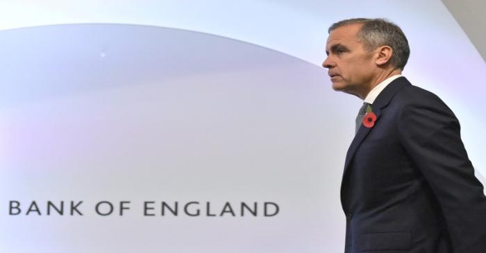 FILE PHOTO: Bank of England Governor Mark Carney attends a Bank of England news conference, in